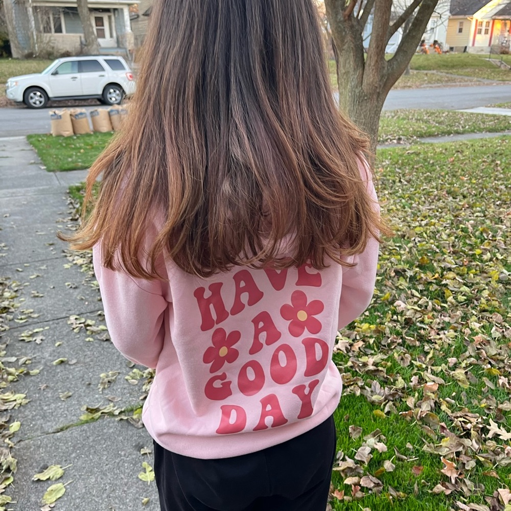 Pink graphic sweat shirt size small.